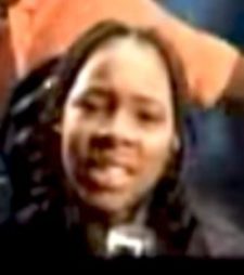 Photo of Reshona, approximately age 14, from her music video Stand By Me (1998)